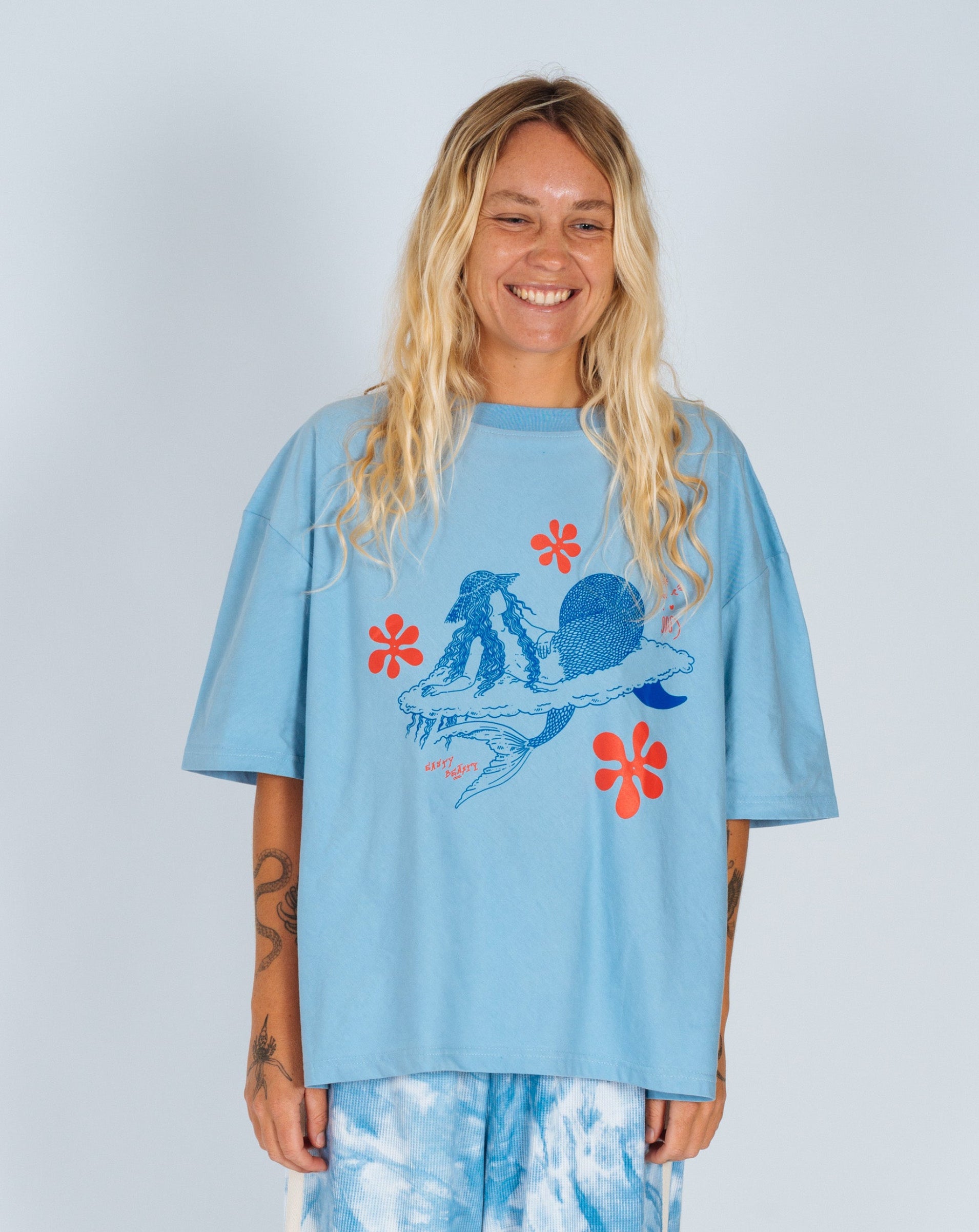 Cloud Surfing by Easty Beasty in Baby Blue - Artist Collaboration Tee - Atmosea